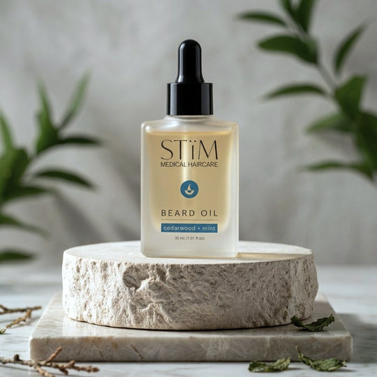 Natural beard oil by STiM in a sleek glass bottle with a dropper, designed for grooming and beard care.